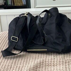 Steve Madden Black Nylon Duffel with hand straps and removable shoulder strap